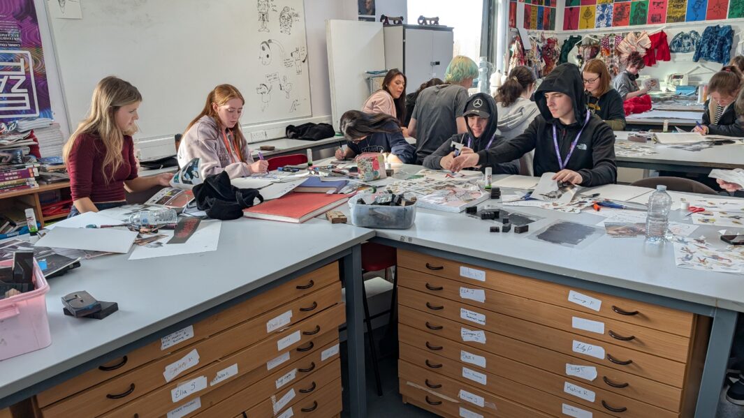 Students in class at an art workshop with James Rice