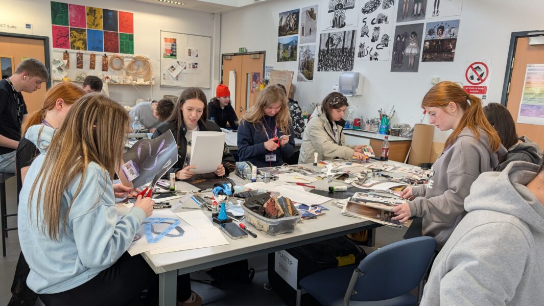 Students in class at an art workshop with James Rice