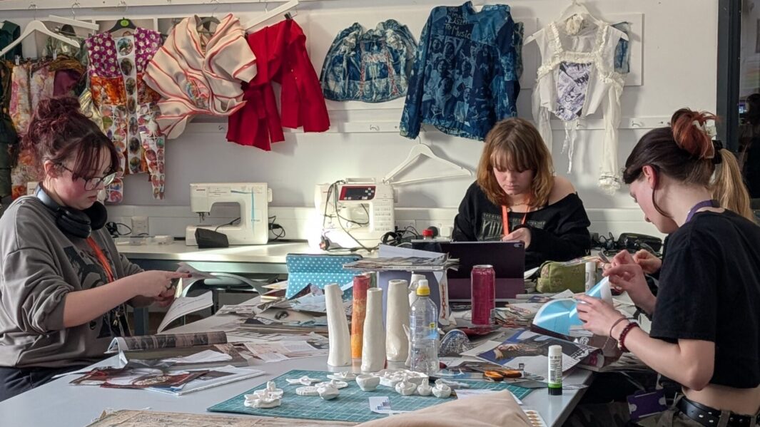 Students in class at an art workshop with James Rice