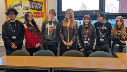 Jess Molyneux with a group of English students