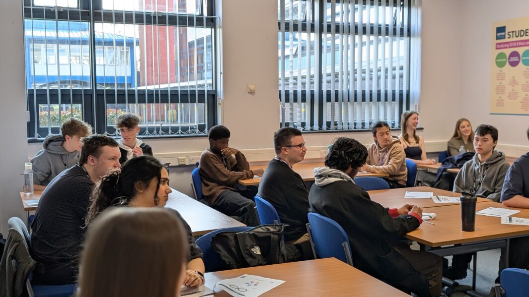 classroom full of boys and girls listening