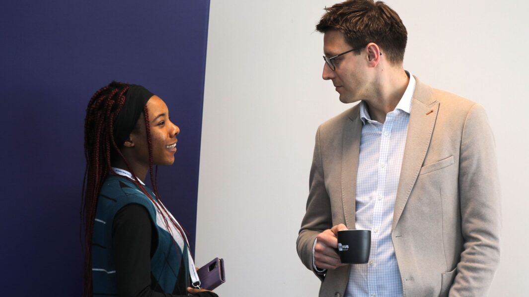 Female student talking to mentor