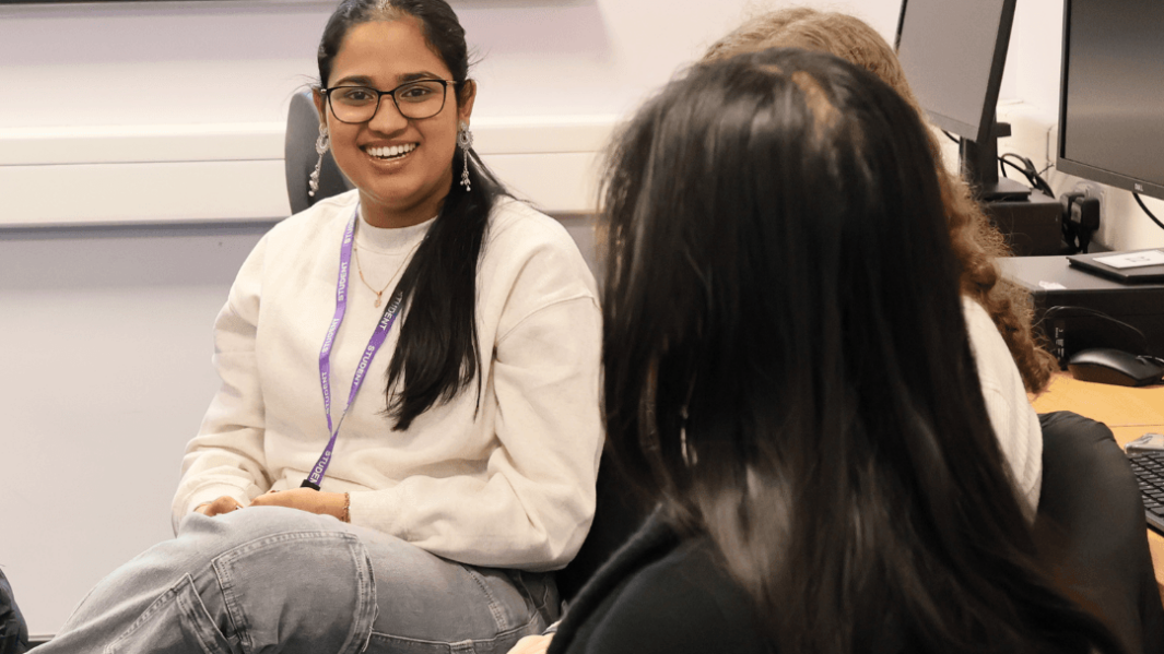 two students chatting together as part of a mental health training session