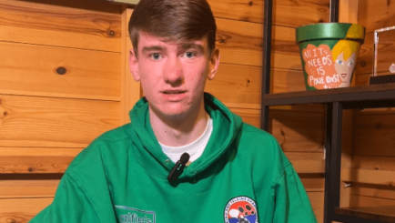 Photo of Carmel student Alfie Fitzsimmons sat doing an interview to camera