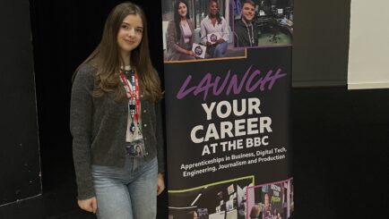 A photo of Mia McAllister stood next to a BBC careers banner