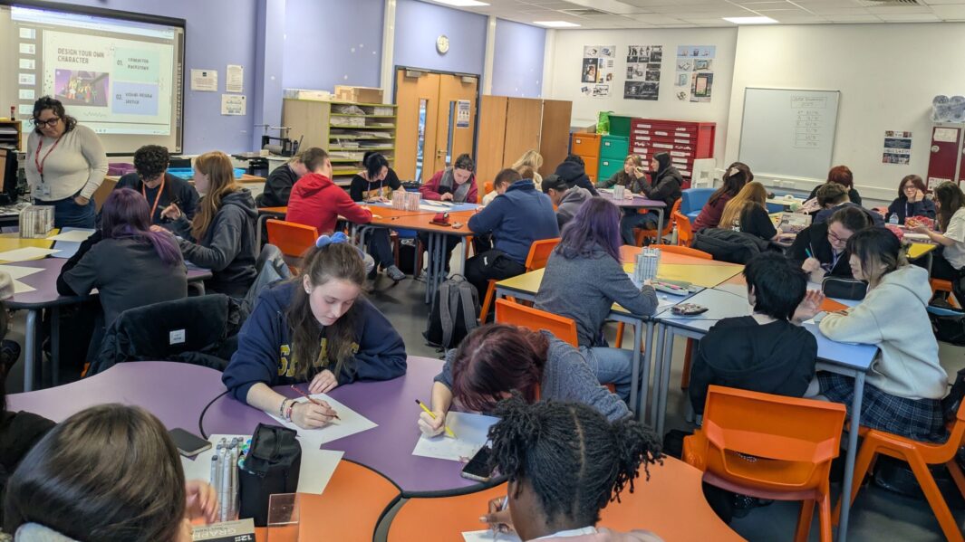 A group of students taking part in a workshop