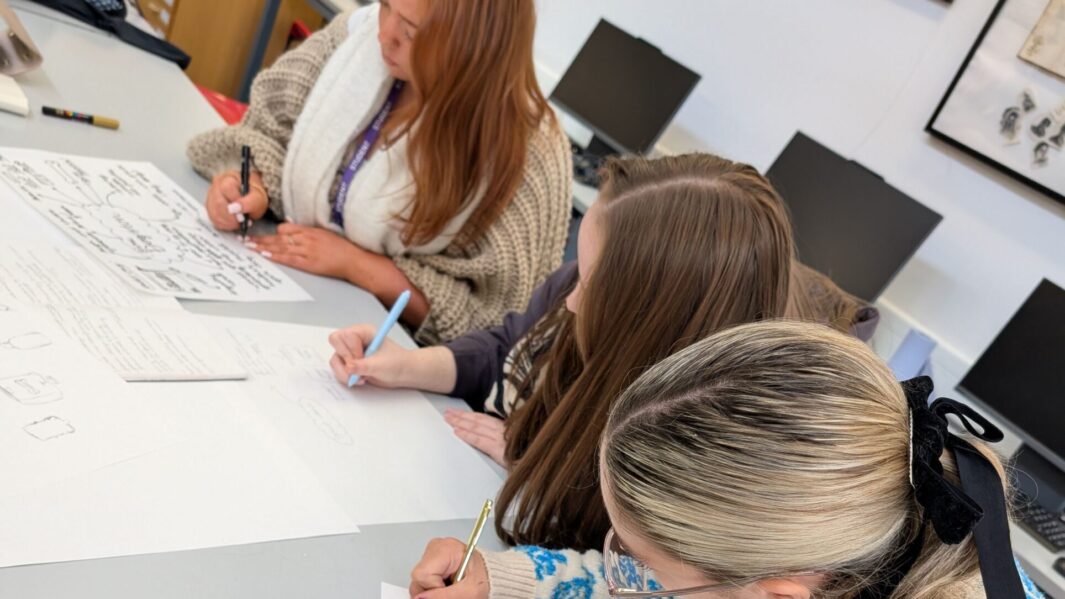 A group of students taking part in a workshop