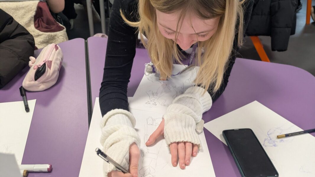 A female student taking part in a workshop