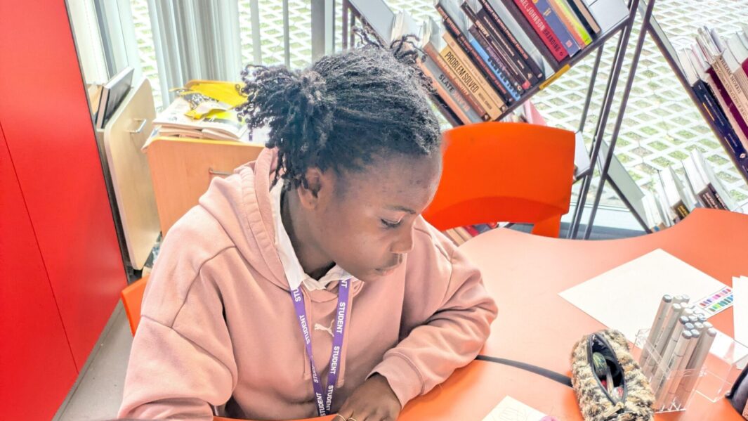 A female student taking part in a workshop