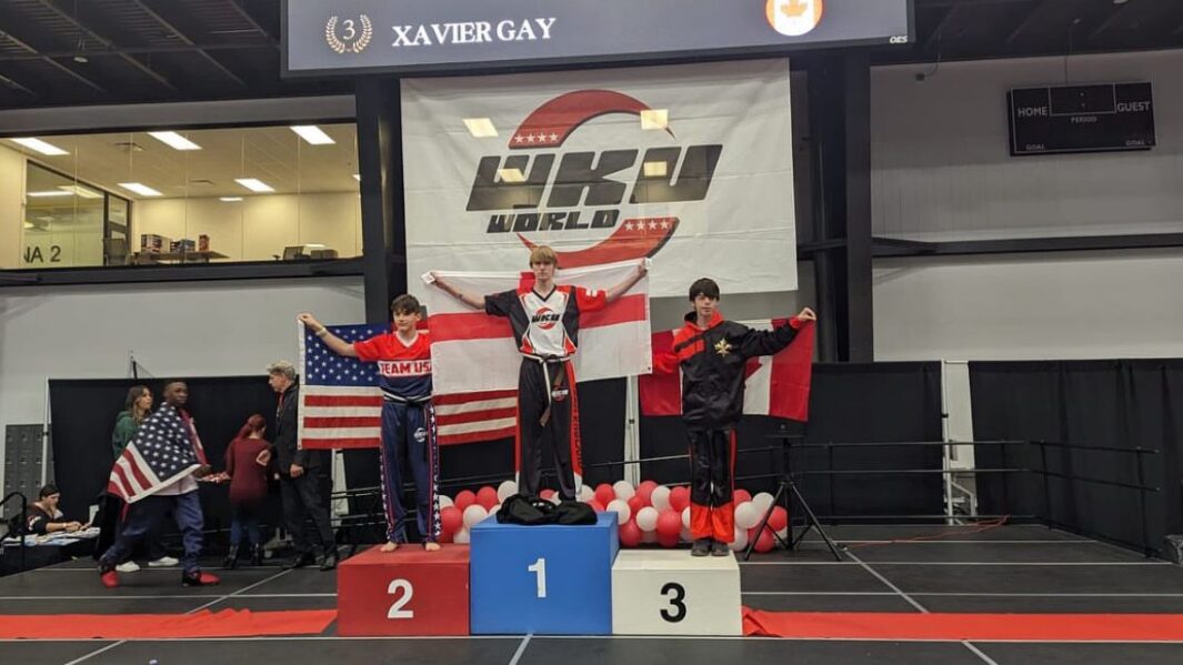 A poduium photo of Tyler K at the world kickboxing championships