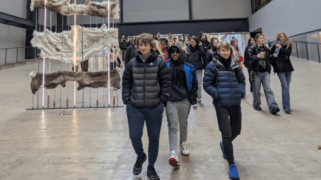 A group of male students in a London museum