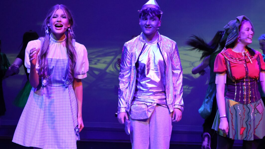 Students dressed as the main characters in the wizard of oz panto