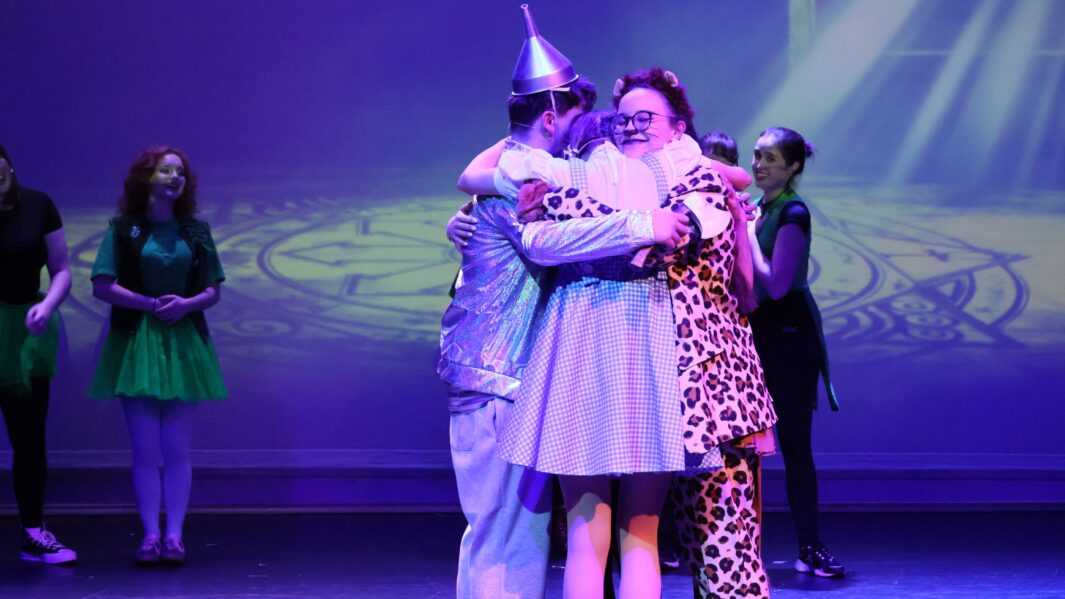 Students dressed as the main characters in the wizard of oz panto