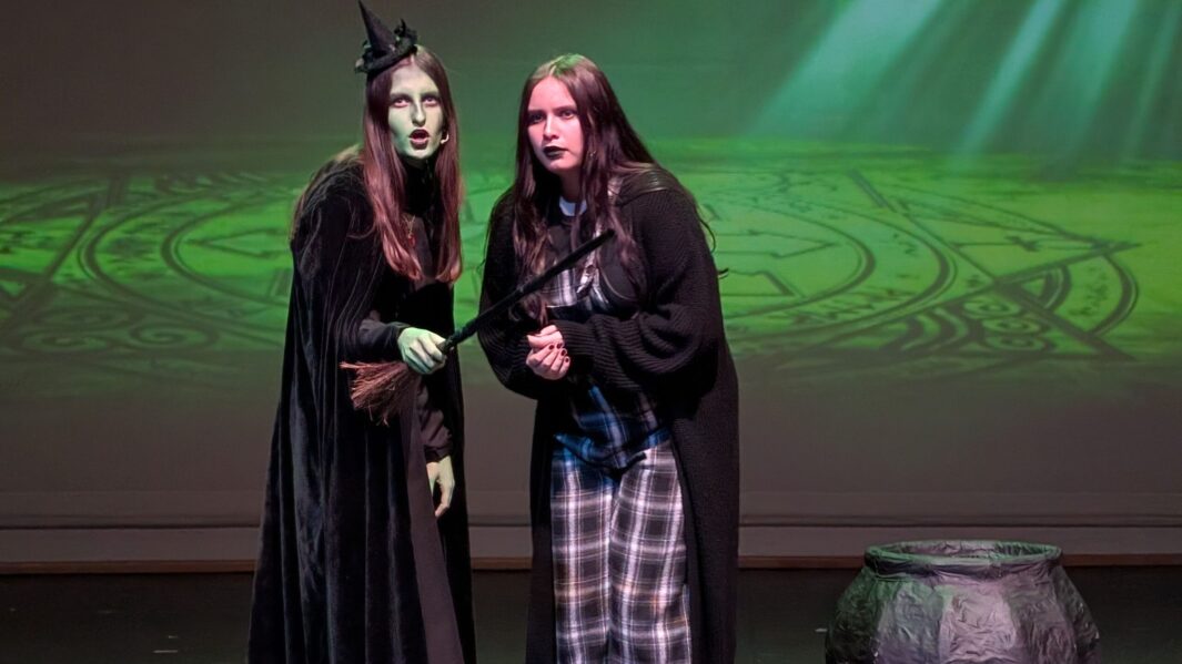 student dressed as the wicked witch of the west and her side kick