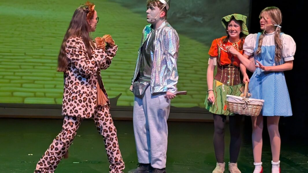 Students dressed as the main characters in the wizard of oz panto