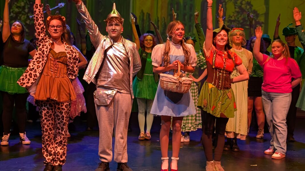 Students dressed as the main characters in the wizard of oz panto