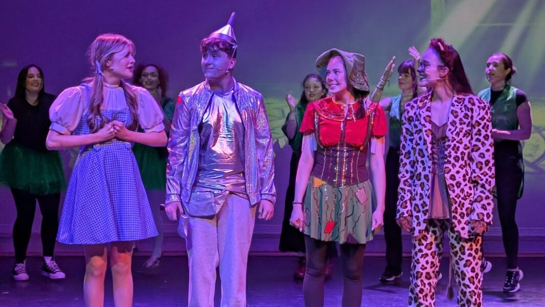 Students dressed as the main characters in the wizard of oz panto