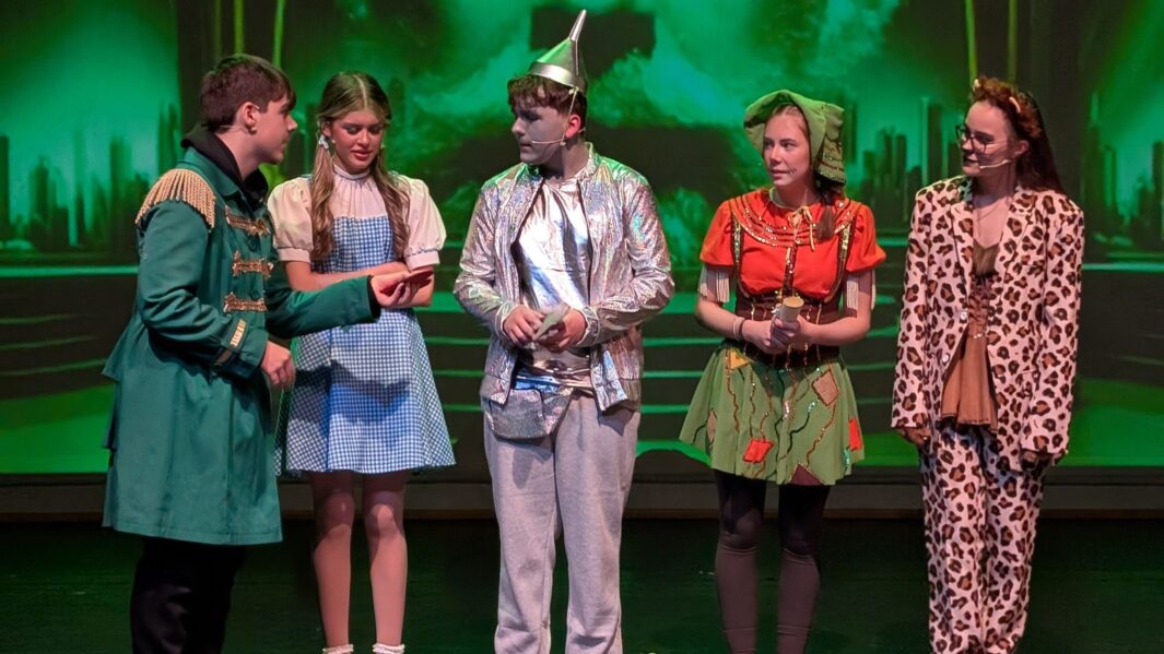 Students dressed as the main characters in the wizard of oz panto