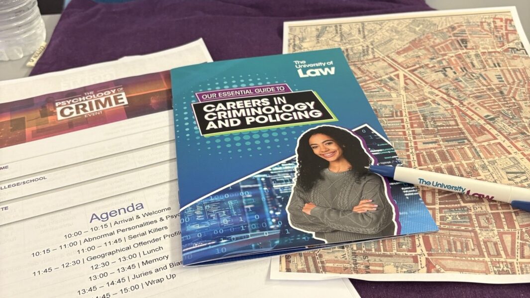 some leaflets and a map spread out on a desk