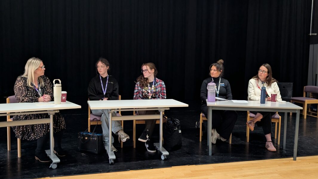 IWD Panel. staff and students sat in the theatre