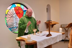 Photo of Fr Domonic leading mass in the Carmel Chapel