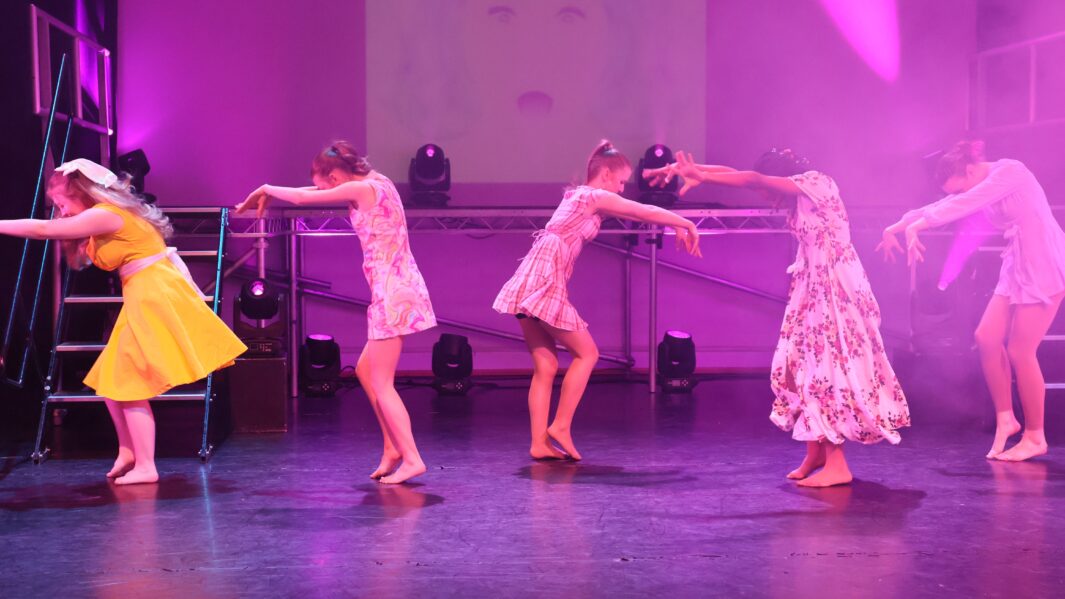 4 girls dancing to a hairspray number on stage
