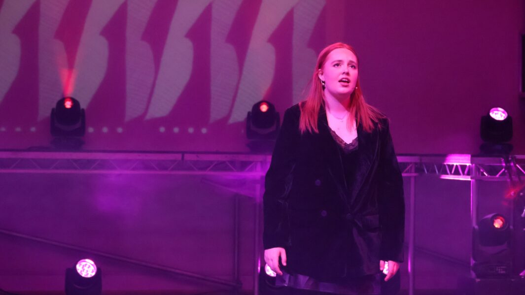 Girl on stage singing