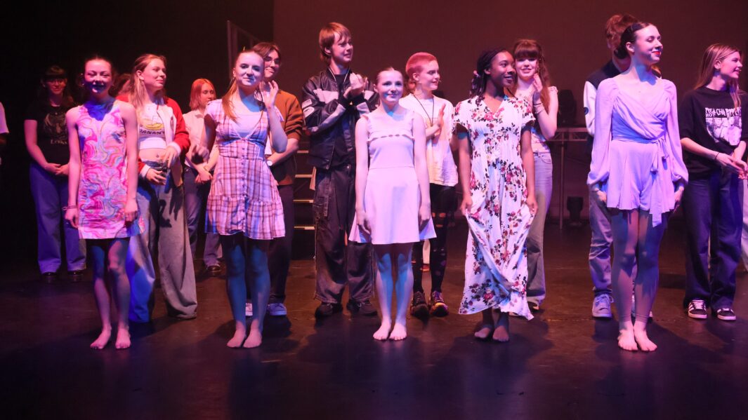 Group pic of students on stage