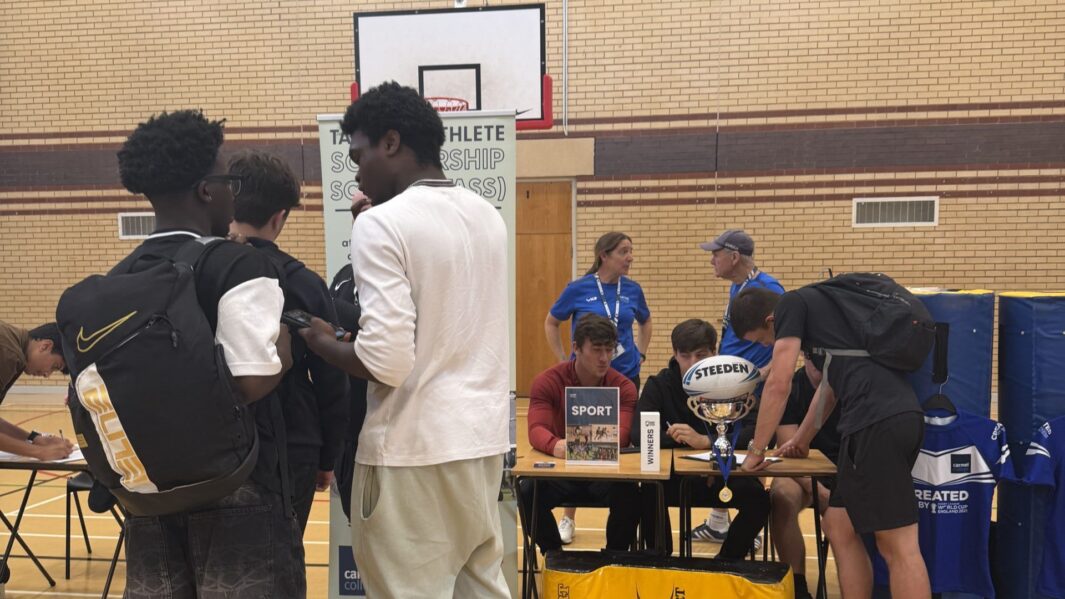 students and staff at the enrichment fair in the sports hall