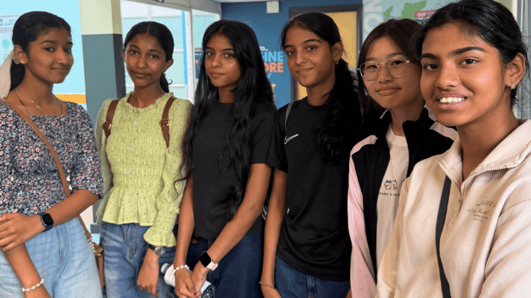 A group of girls in the cafe area at Carmel