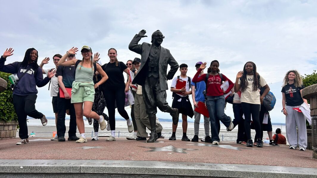 Students stood with statue of Eric Morecambe