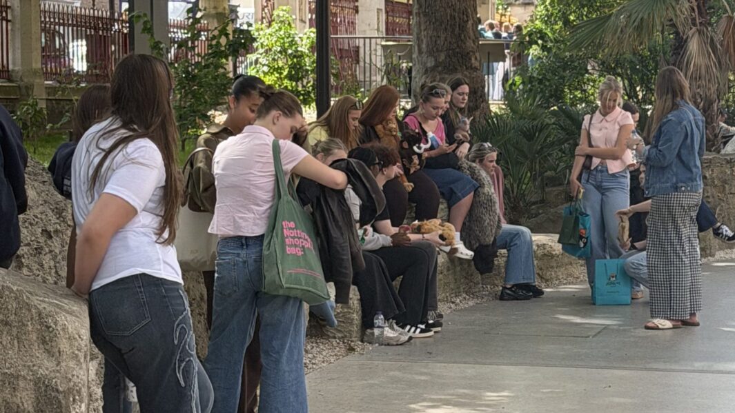 students seen sat in a park