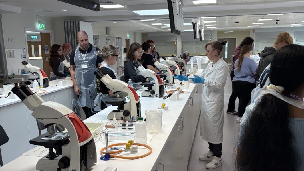 Female students doing experiments in a lab at Edge Hill Uni