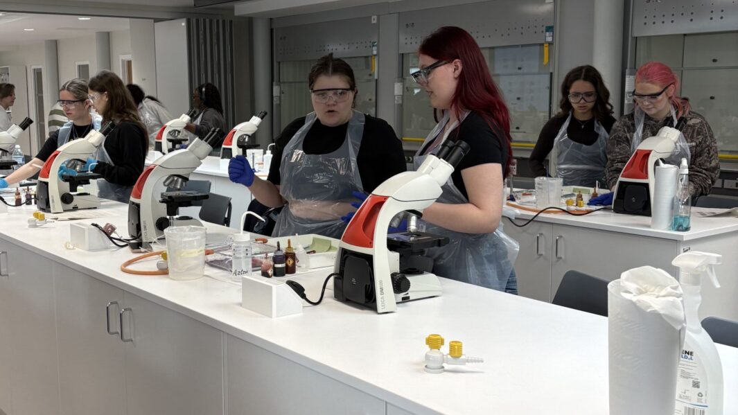 Female students doing experiments in a lab at Edge Hill Uni