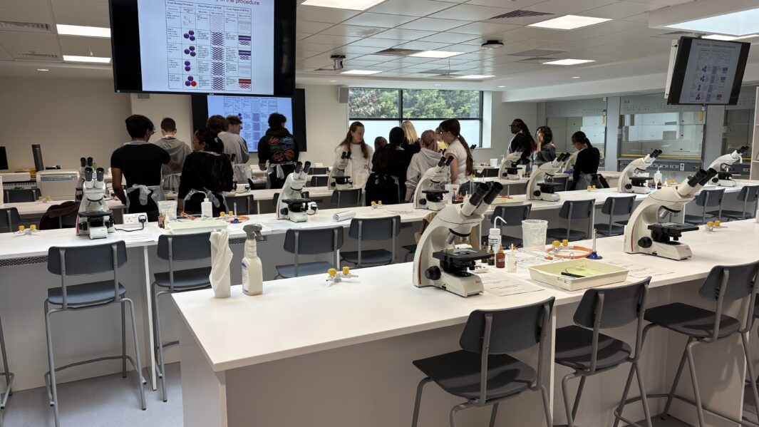 Students doing experiments in a lab at Edge Hill Uni