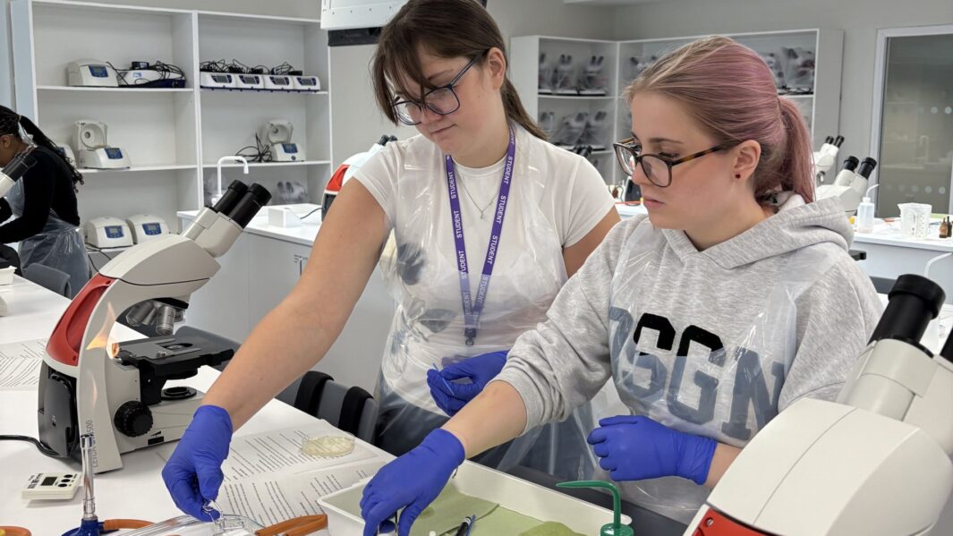 Female students doing experiments in a lab at Edge Hill Uni