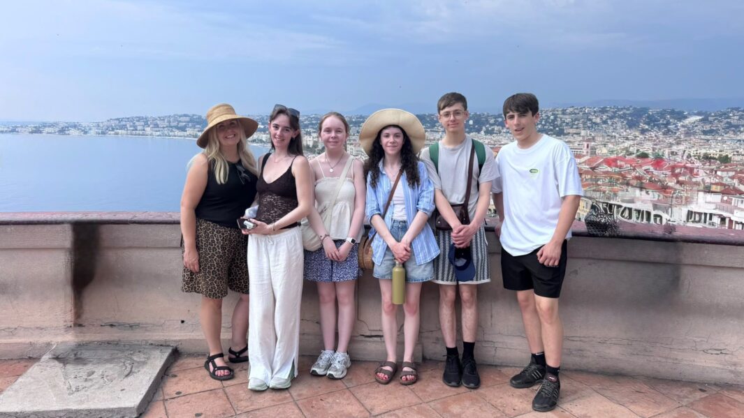 students pose for picture on a view point in Nice