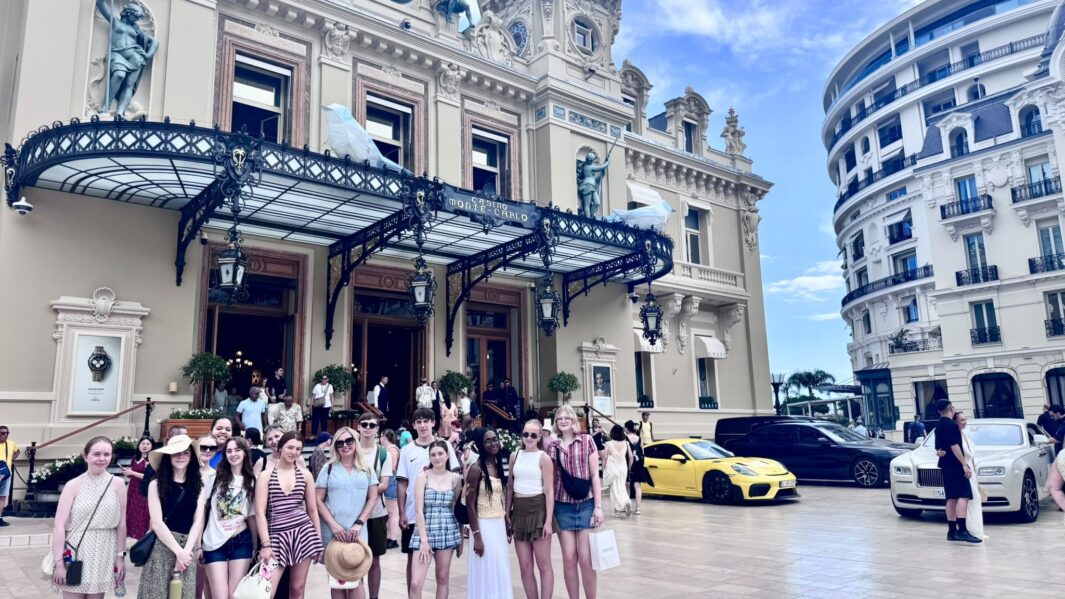 students stood outside Monaco hotel